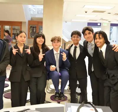 HSE Speech & Debate students gathered together between rounds